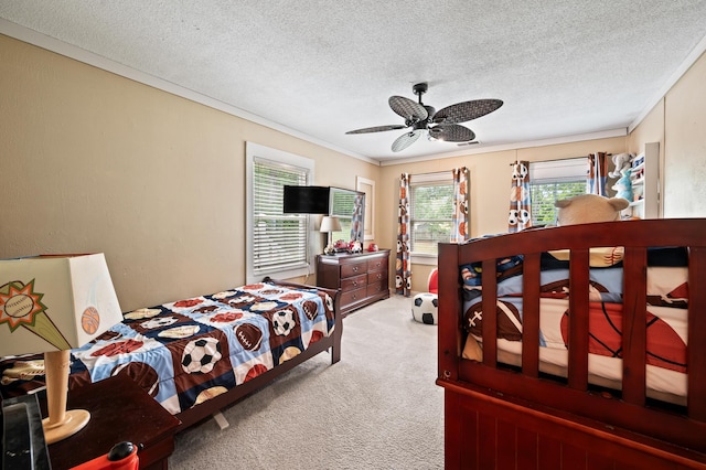 225 Baxter Ln, Walterboro, SC 29488 - bedroom with light colored carpet, crown molding, multiple windows, a textured ceiling, and a ceiling fan