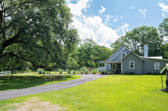 225 Baxter Ln, Walterboro, SC 29488 - view of front facade with a chimney and asphalt driveway