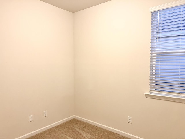 view of carpeted spare room