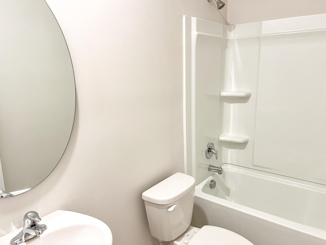 full bathroom with toilet, tub / shower combination, and sink