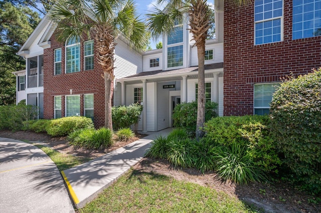 115 Golfview Ln, Summerville, SC 29485 - traditional home with brick siding and covered porch