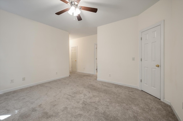 115 Golfview Ln, Summerville, SC 29485 - empty room featuring light carpet, a ceiling fan, and baseboards