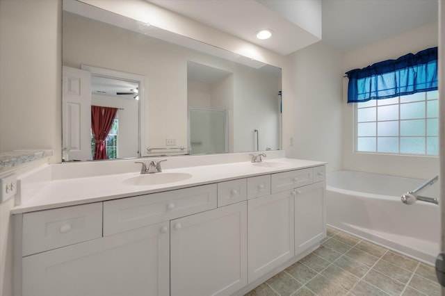 115 Golfview Ln, Summerville, SC 29485 - bathroom with double vanity, a bath, an enclosed shower, and recessed lighting