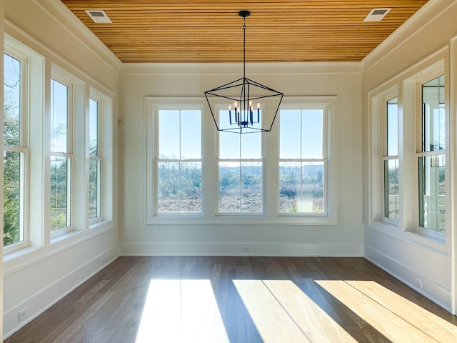 unfurnished sunroom featuring wooden ceiling and an inviting chandelier