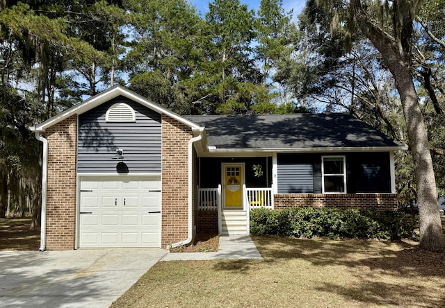 ranch-style home featuring a porch, brick siding, and driveway