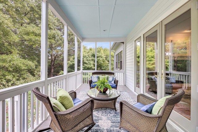 sunroom / solarium featuring an outdoor living space
