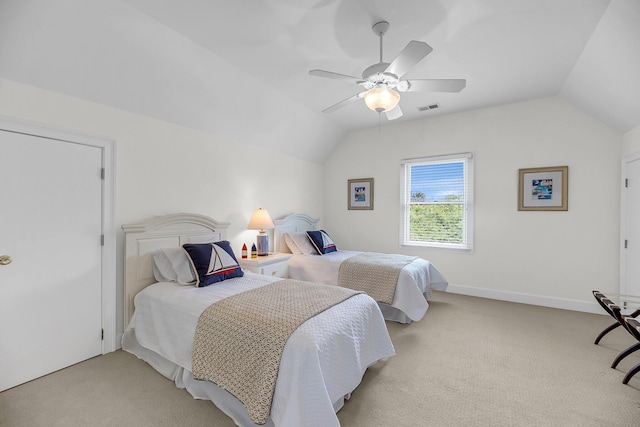 bedroom with lofted ceiling, carpet flooring, and ceiling fan