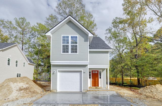 front of property featuring a garage