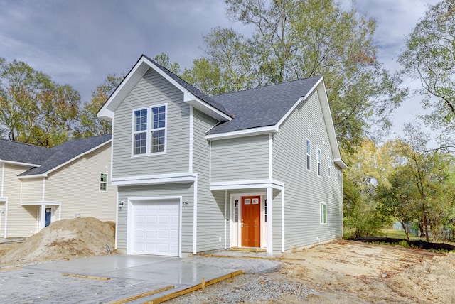 front of property featuring a garage