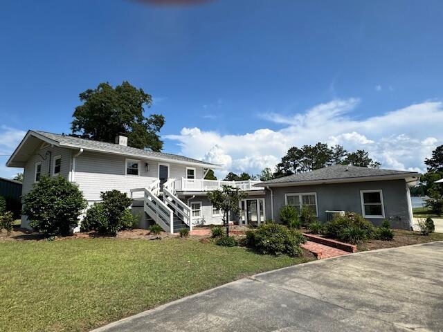 1129 Levi St, Manning, SC 29102 - view of front of property with stairs and a front lawn