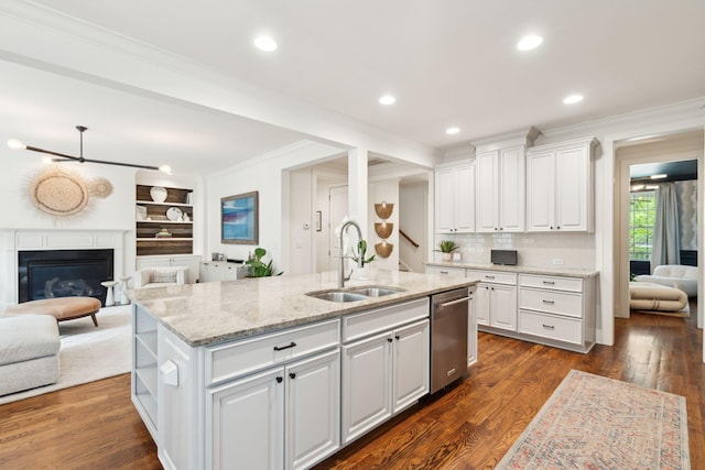 1407 Wando View St, Daniel Island, SC 29492 - kitchen with stainless steel dishwasher, crown molding, white cabinets, a center island with sink, and open floor plan
