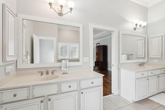 1407 Wando View St, Daniel Island, SC 29492 - bathroom featuring a chandelier, vanity, ornamental molding, and tile patterned floors
