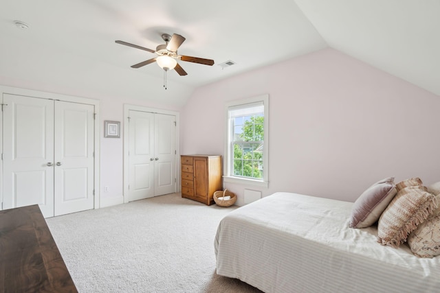 1407 Wando View St, Daniel Island, SC 29492 - carpeted bedroom featuring vaulted ceiling, two closets, and ceiling fan