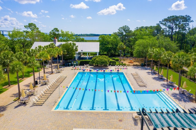 1407 Wando View St, Daniel Island, SC 29492 - community pool with a patio and view of wooded area