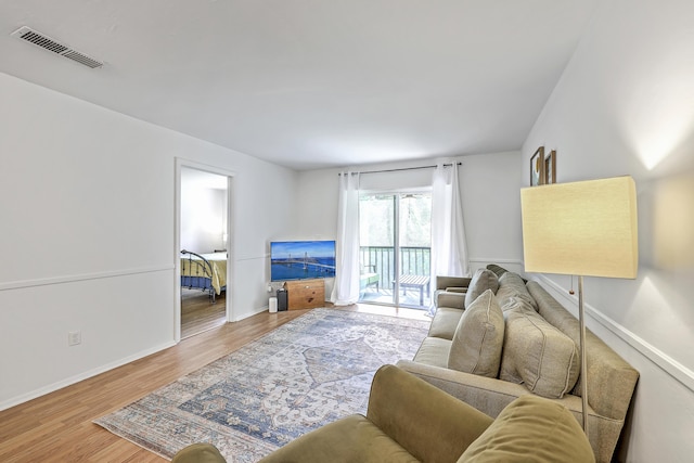 2174 Bees Ferry Rd Unit G, Charleston, SC 29414 - living area with wood finished floors and baseboards