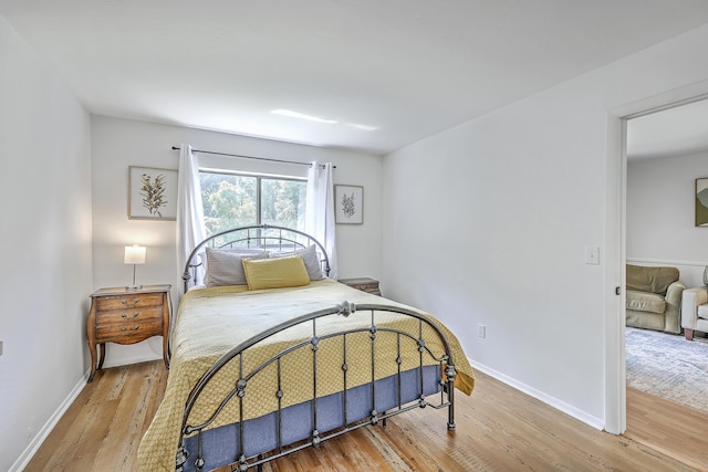 2174 Bees Ferry Rd Unit G, Charleston, SC 29414 - bedroom with wood finished floors and baseboards