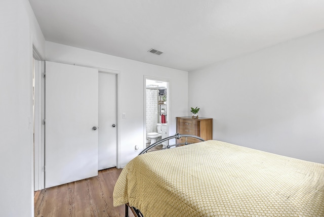2174 Bees Ferry Rd Unit G, Charleston, SC 29414 - bedroom featuring wood finished floors and connected bathroom