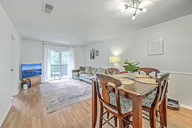 2174 Bees Ferry Rd Unit G, Charleston, SC 29414 - dining room with light wood-type flooring and baseboards