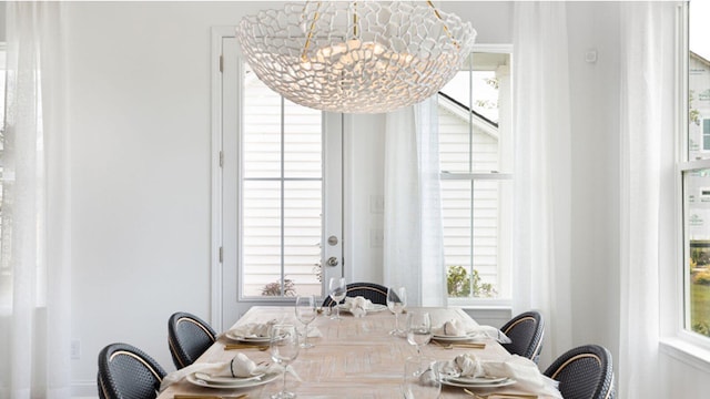 dining room featuring a chandelier