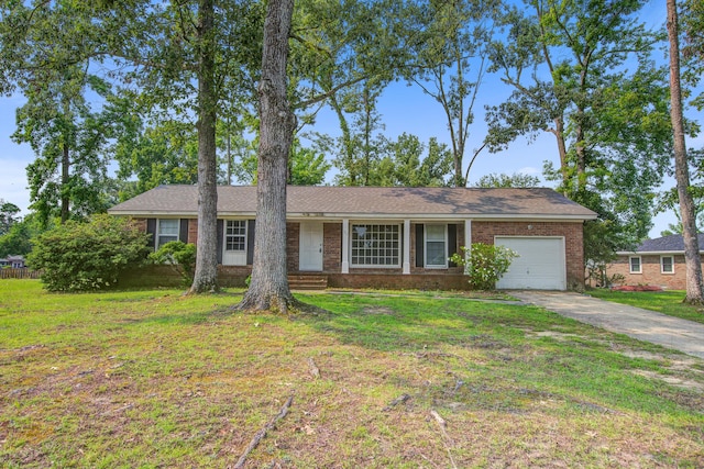 127 Cornell Dr, Ladson, SC 29456 - ranch-style house with a garage, a front yard, driveway, and brick siding