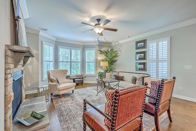 3152 Riverine, Charleston, SC 29414 - living area featuring ceiling fan, wood finished floors, ornamental molding, baseboards, and a fireplace