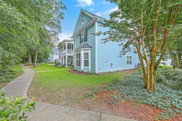 3152 Riverine, Charleston, SC 29414 - view of side of home featuring a yard