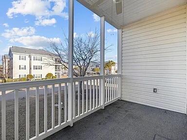 balcony with a ceiling fan