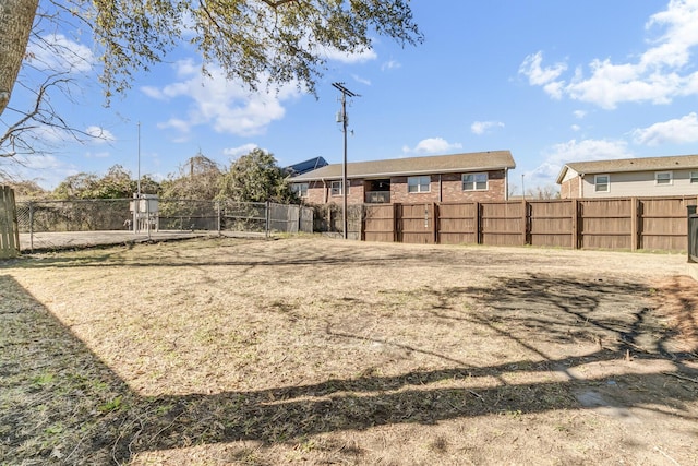 view of yard with fence