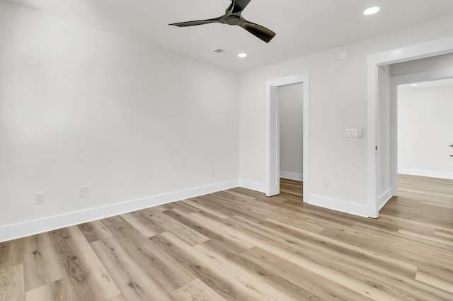 spare room with visible vents, baseboards, a ceiling fan, light wood-type flooring, and recessed lighting