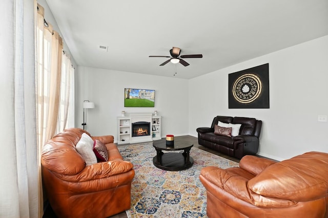 living room featuring ceiling fan