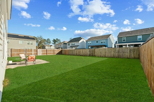 view of yard with a patio area