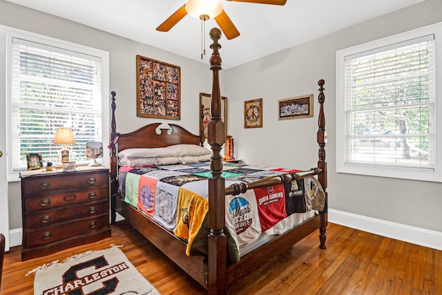 bedroom featuring wood-type flooring and ceiling fan