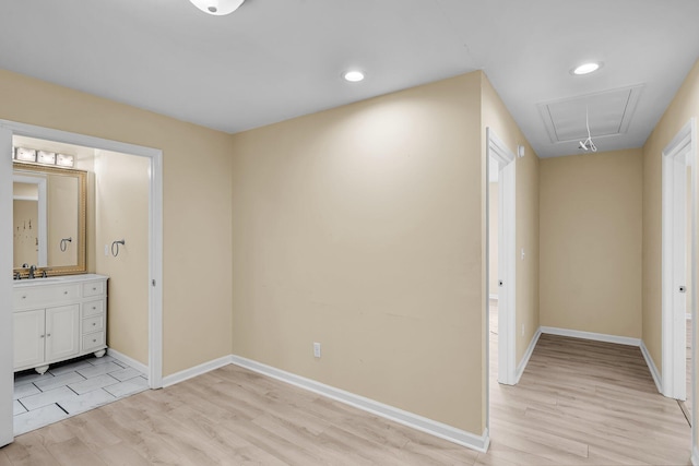62 Wexford Way, Walterboro, SC 29488 - unfurnished bedroom with attic access, light wood-style flooring, a sink, baseboards, and recessed lighting
