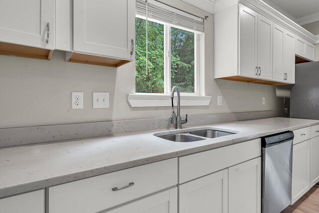 62 Wexford Way, Walterboro, SC 29488 - kitchen featuring a sink, dishwasher, white cabinets, light stone counters, and crown molding