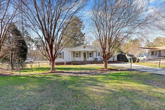 ranch-style home with a porch and a front yard