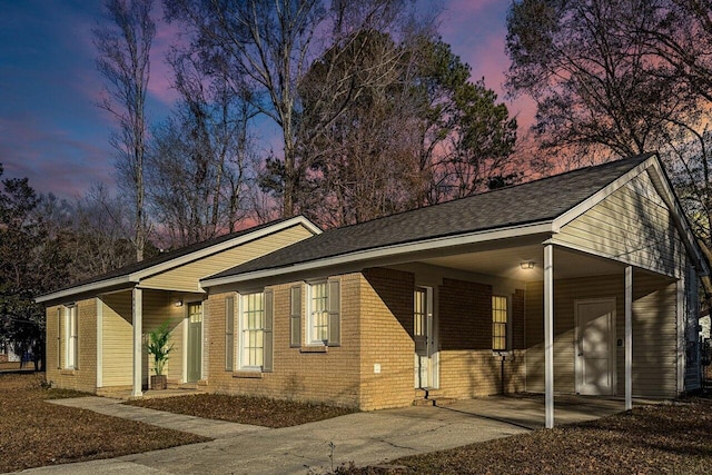 single story home with a carport