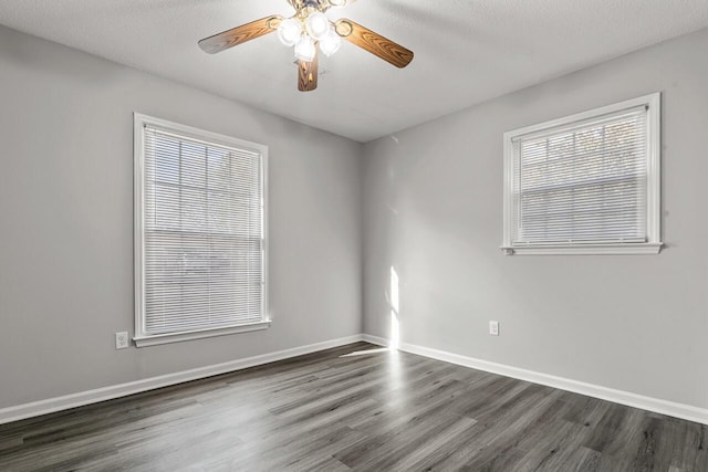 unfurnished room with a textured ceiling, ceiling fan, and a healthy amount of sunlight