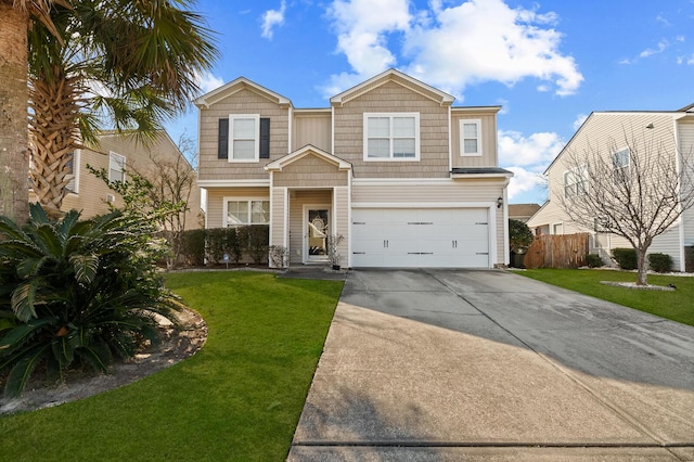 view of front of property with a garage and a front lawn