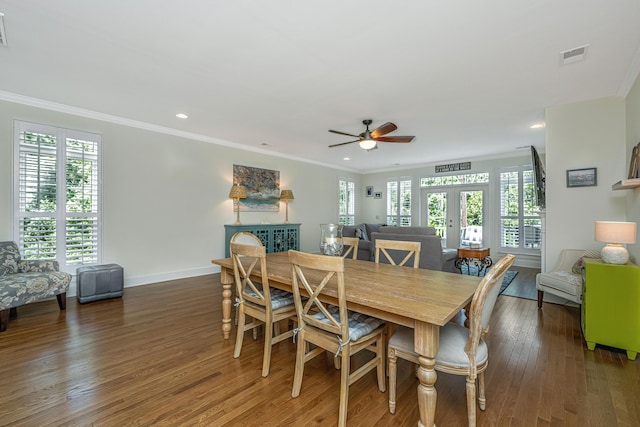 dining area featuring french doors, dark hardwood / wood-style floors, ceiling fan, and ornamental molding