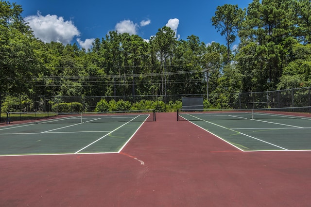 view of sport court featuring basketball hoop