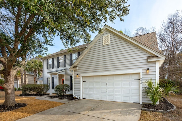 view of front of house with a garage