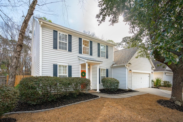 colonial inspired home with a garage