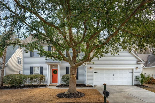 view of front of property featuring a garage