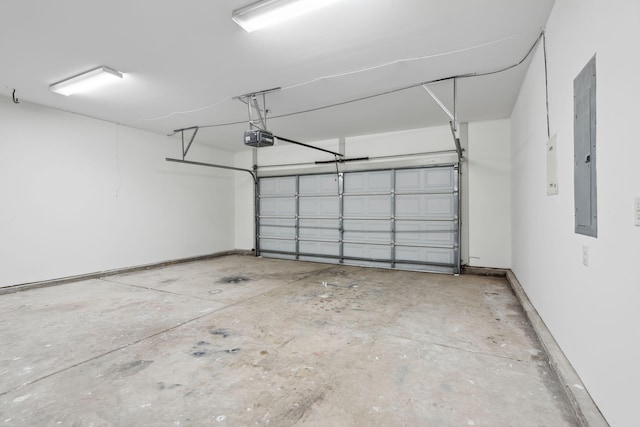 garage featuring a garage door opener and electric panel