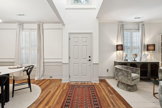 entryway with light hardwood / wood-style floors