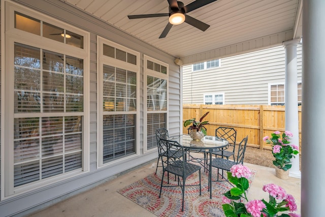 view of patio featuring ceiling fan