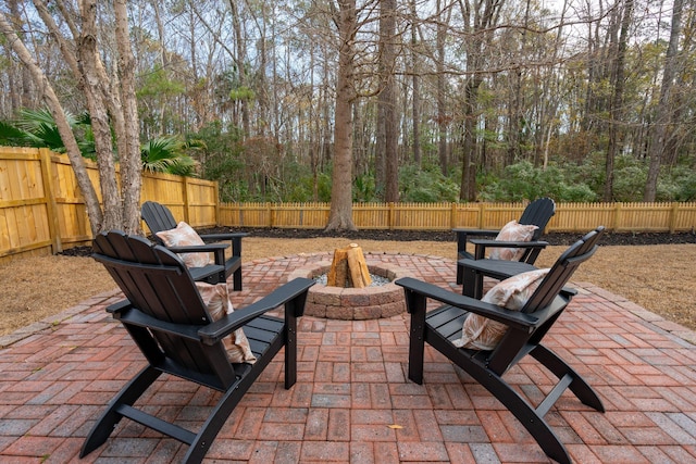 view of patio featuring a fire pit