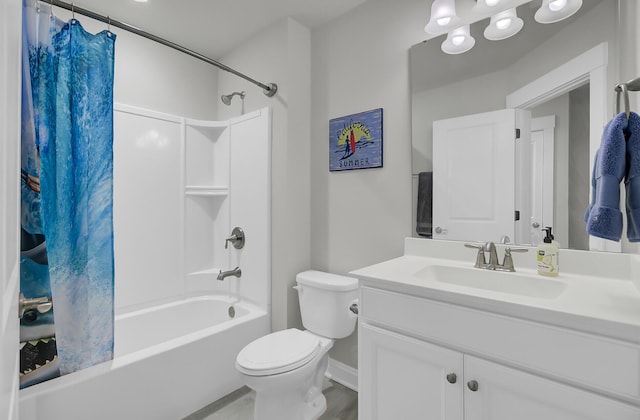 bathroom with vanity, shower / bath combination with curtain, and toilet