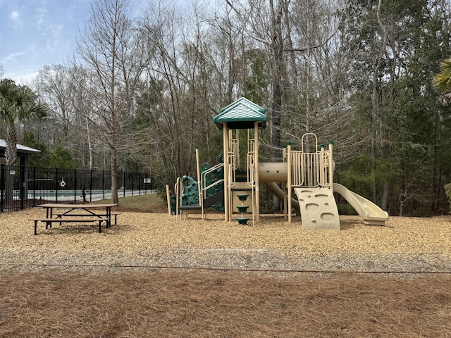 community playground featuring fence