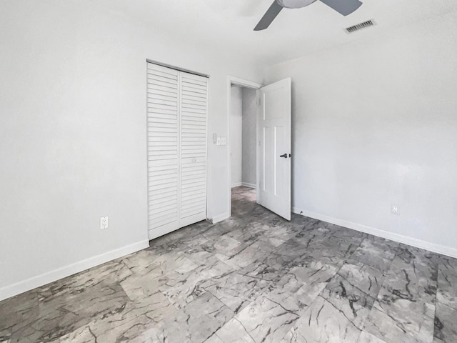 unfurnished bedroom with a closet and ceiling fan